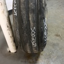 11.00/-16 Firestone Champion Guide Grip 4-Rib F-2M on John Deere Yellow 8-Hole Implement 35%