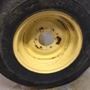 7.50/-16 Firestone Champion Guide Grip 3-Rib F-2 on John Deere Yellow 6-Hole Implement 65%