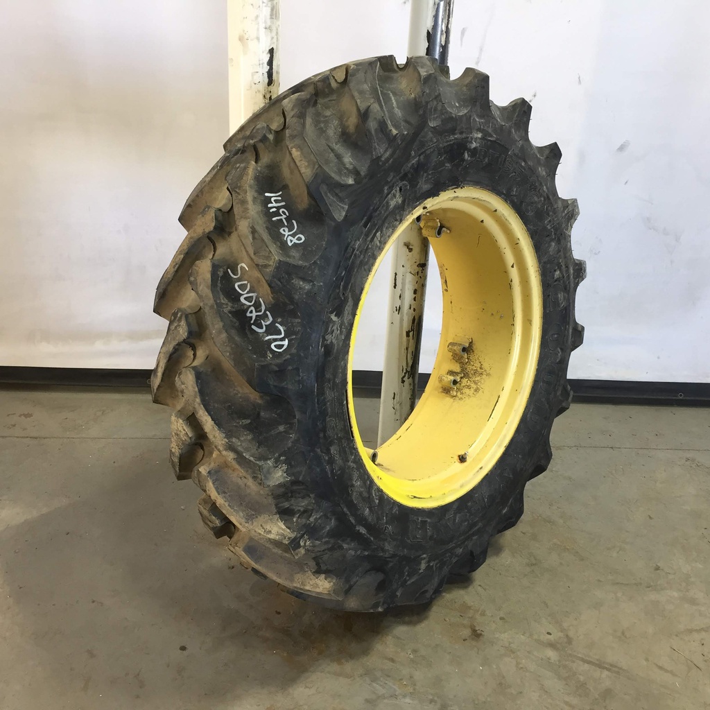 14.9/-28 Goodyear Farm DT195 R-1 on John Deere Yellow 8-Hole Rim with Clamp/Loop Style (groups of 2 bolts) 99%