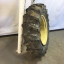 14.9/-28 Firestone Traction Field & Road R-1 on John Deere Yellow 6-Hole Rim with Clamp/Loop Style 75%