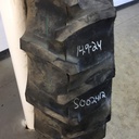 14.9/-24 Firestone Traction Field & Road R-1 on John Deere Yellow 8-Hole Rim with Clamp/Loop Style (groups of 2 bolts) 95%