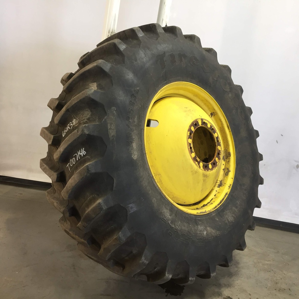 650/85R38 Firestone Radial Deep Tread 23 R-1W on John Deere Yellow 10-Hole Dolly Dual 85%