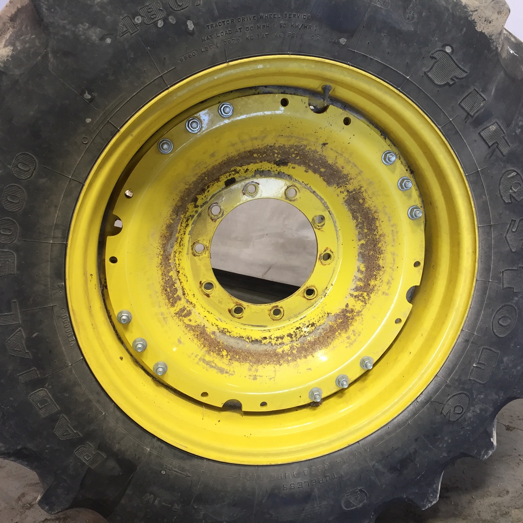 480/70R34 Firestone Radial 9000 R-1W on John Deere Yellow 10-Hole Waffle Wheel (Groups of 3 bolts) 85%