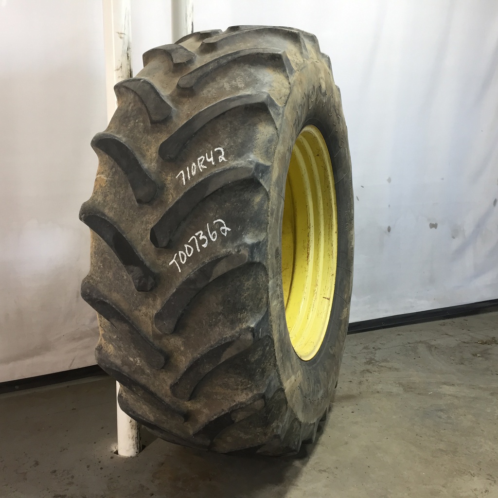 710/70R42 Firestone Radial All Traction DT R-1W on John Deere Yellow 10-Hole Formed Plate W/Weight Holes 40%
