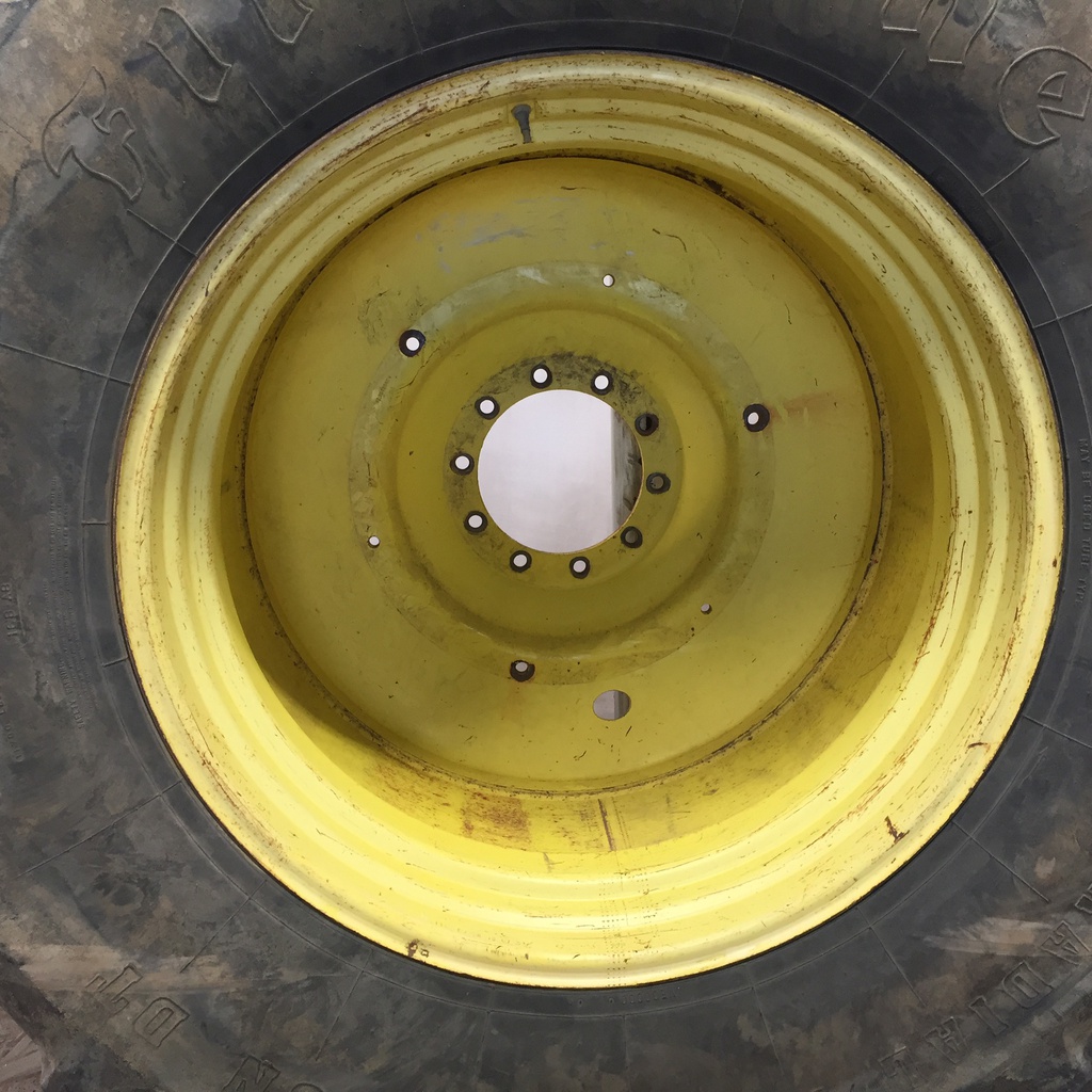 710/70R42 Firestone Radial All Traction DT R-1W on John Deere Yellow 10-Hole Formed Plate W/Weight Holes 40%