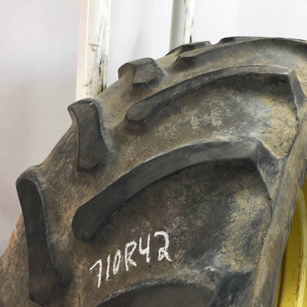 710/70R42 Firestone Radial All Traction DT R-1W on John Deere Yellow 10-Hole Formed Plate W/Weight Holes 40%