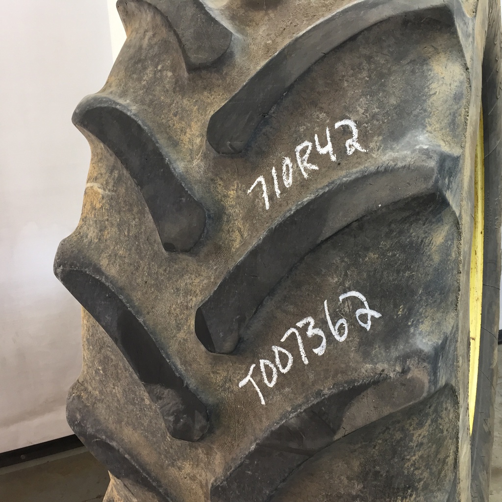 710/70R42 Firestone Radial All Traction DT R-1W on John Deere Yellow 10-Hole Formed Plate W/Weight Holes 40%