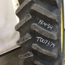 18.4/-34 Firestone Super All Traction 23 R-1 on John Deere Yellow 8-Hole Rim with Clamp/U-Clamp (groups of 2 bolts) 95%