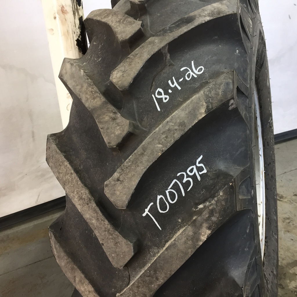 18.4/-26 BKT Tires AS 2001 Drive R-1 142 A8, F (12 Ply) 65%