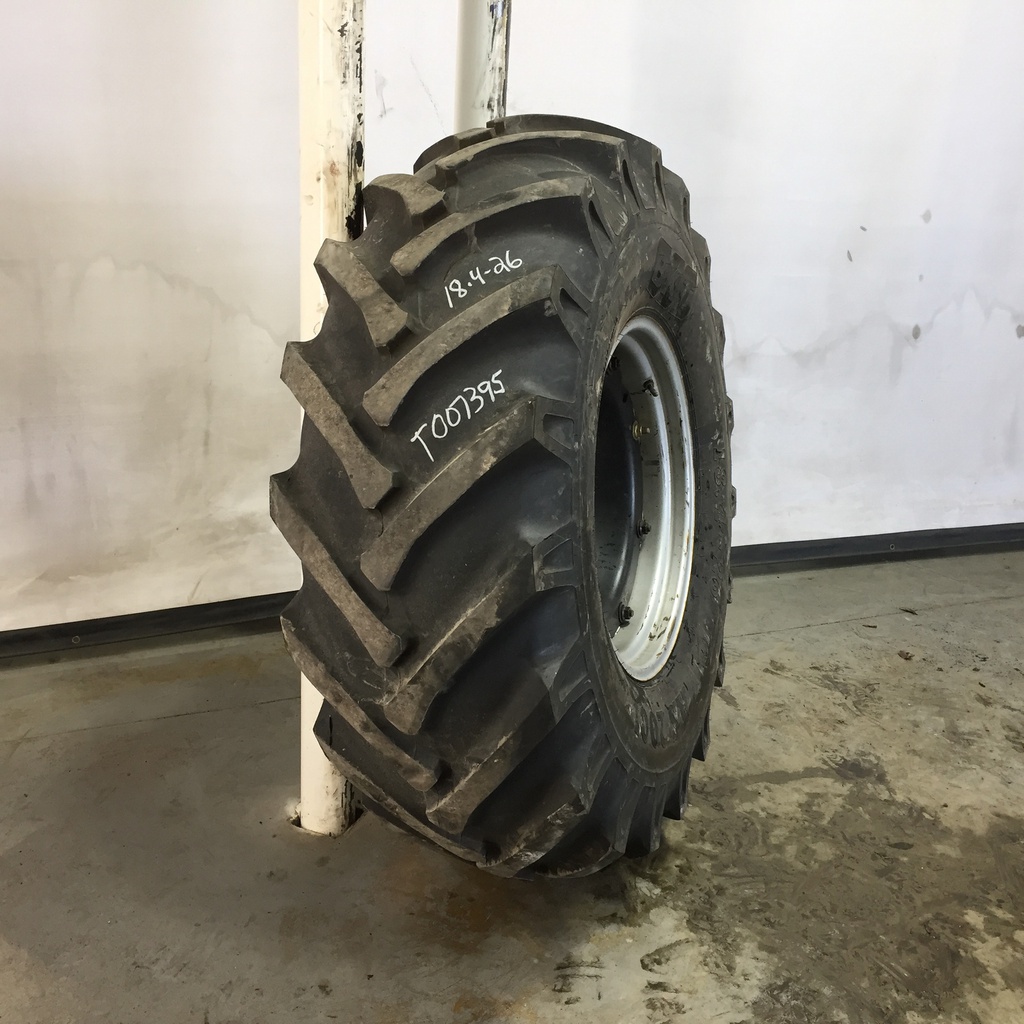 18.4/-26 BKT Tires AS 2001 Drive R-1 142 A8, F (12 Ply) 65%