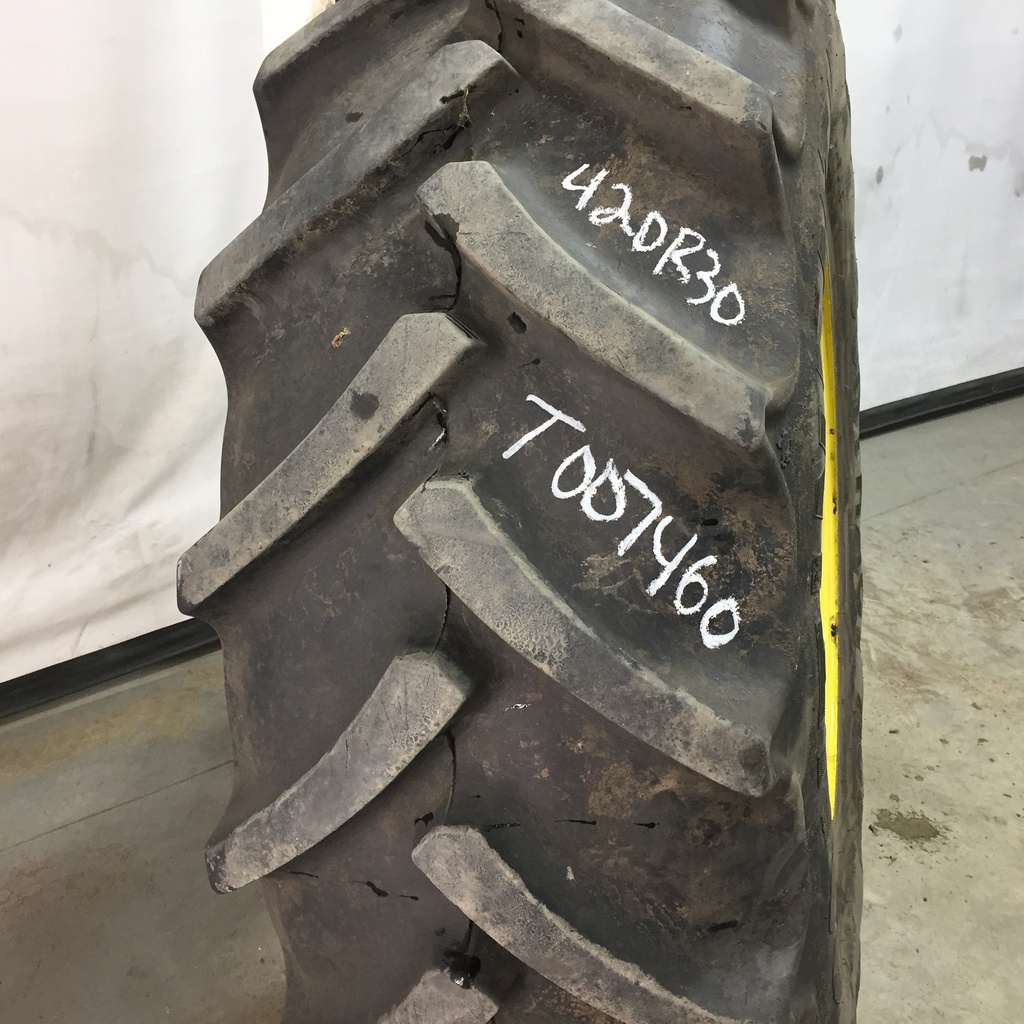 420/85R30 Continental AC85 Contract R-1W on John Deere Yellow 8-Hole Stub Disc (groups of 2 bolts) 75%