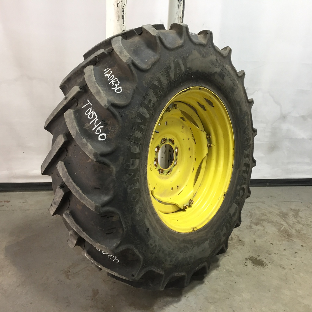 420/85R30 Continental AC85 Contract R-1W on John Deere Yellow 8-Hole Stub Disc (groups of 2 bolts) 75%