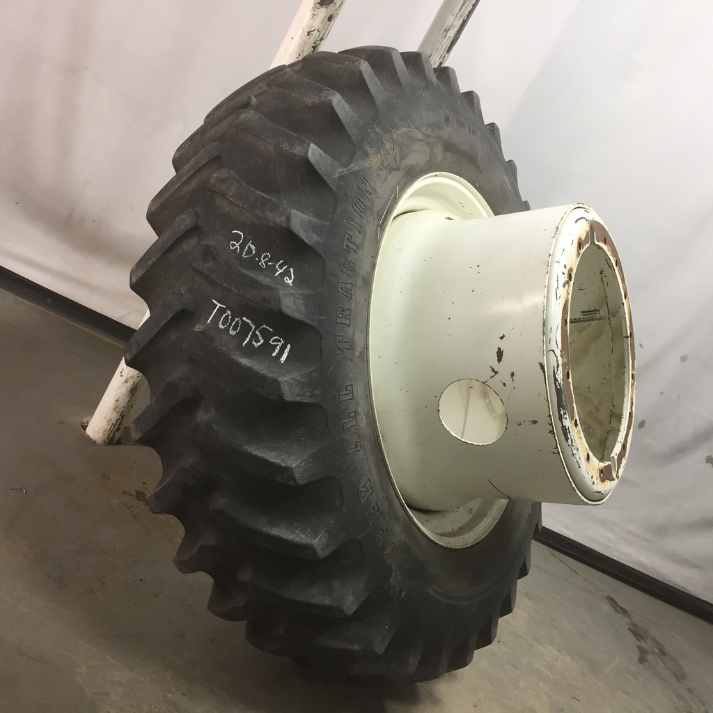 20.8/-42 Firestone Super All Traction 23 R-1 on New Holland White 16-Hole Tiger Planetary Drive Dual 80%
