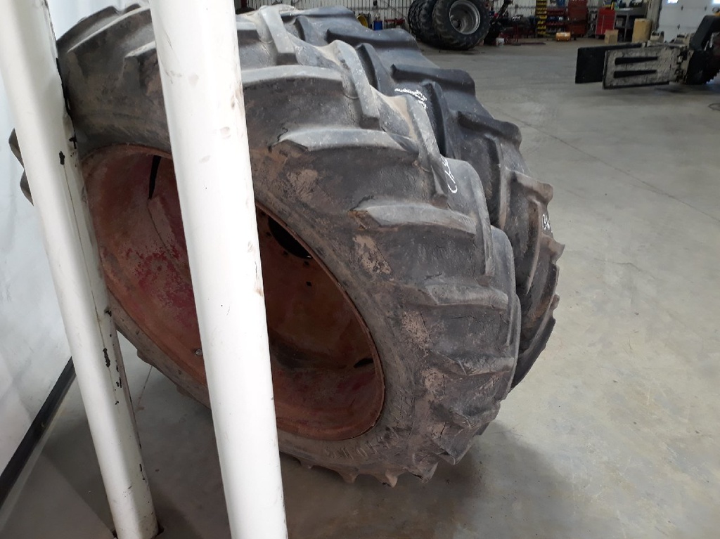 13.6/-38 Firestone Champion Ground Grip R-1 A8, C (6 Ply) 40%