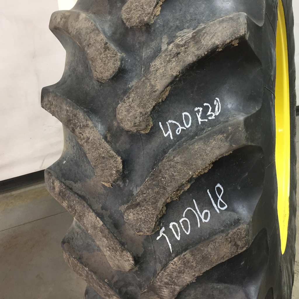420/90R30 Firestone Radial All Traction FWD R-1 on John Deere Yellow 10-Hole Waffle Wheel (Groups of 3 bolts) 65%