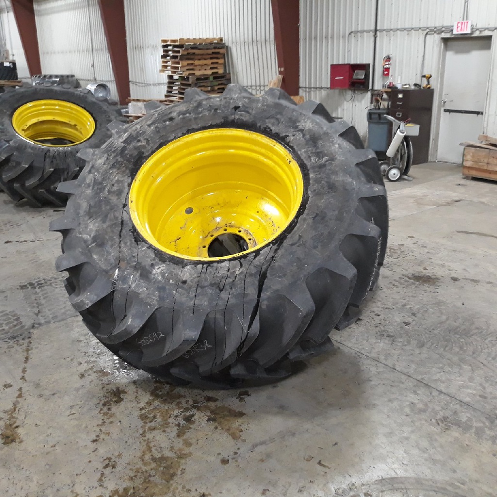 650/85R38 Michelin MachXBib R-1W on John Deere Yellow 10-Hole Formed Plate W/Weight Holes 99%