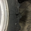 380/80R38 Firestone Radial All Traction DT R-1W on Case IH Silver Mist/John Deere Yellow 12-Hole Waffle Wheel (Groups of 3 bolts) 80%