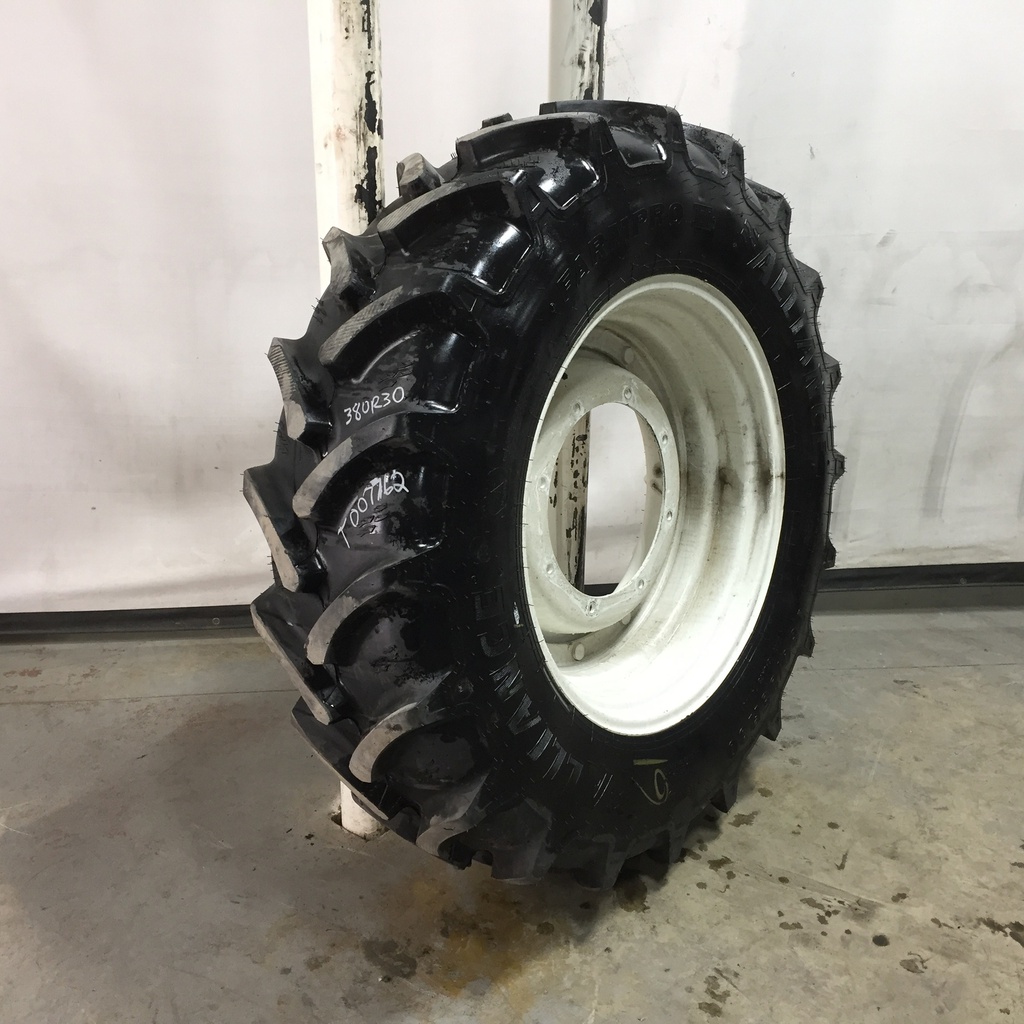 380/85R30 Alliance 846 Farm Pro II 85 Series R-1W on New Holland White 8-Hole Stub Disc 99%