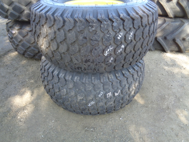 44/18.00-20 Goodyear Farm Softrac NHS HF-1 on John Deere Yellow 8-Hole Formed Plate 65%