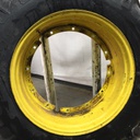 18.4/-38 BKT Tires TR 135 Drive R-1 on John Deere Yellow 12-Hole Stub Disc 60%