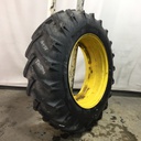 18.4/-38 BKT Tires TR 135 Drive R-1 on John Deere Yellow 12-Hole Stub Disc 60%