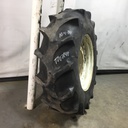18.4/-30 Firestone Champion Spade Grip R-2 on New Holland White 12-Hole Waffle Wheel (Groups of 2 bolts) 25%