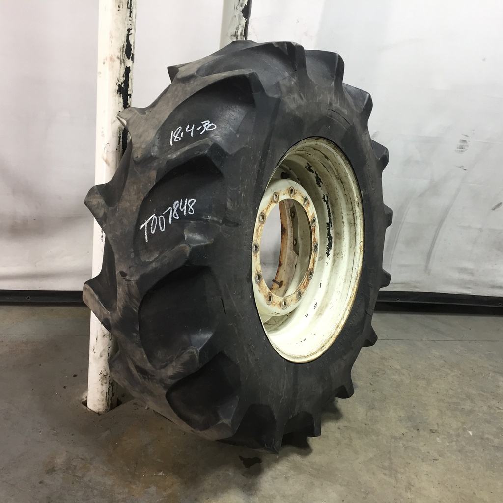 18.4/-30 Firestone Champion Spade Grip R-2 on New Holland White 12-Hole Waffle Wheel (Groups of 2 bolts) 25%