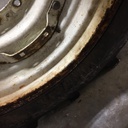 18.4/-30 Firestone Champion Spade Grip R-2 on New Holland White 12-Hole Waffle Wheel (Groups of 2 bolts) 25%