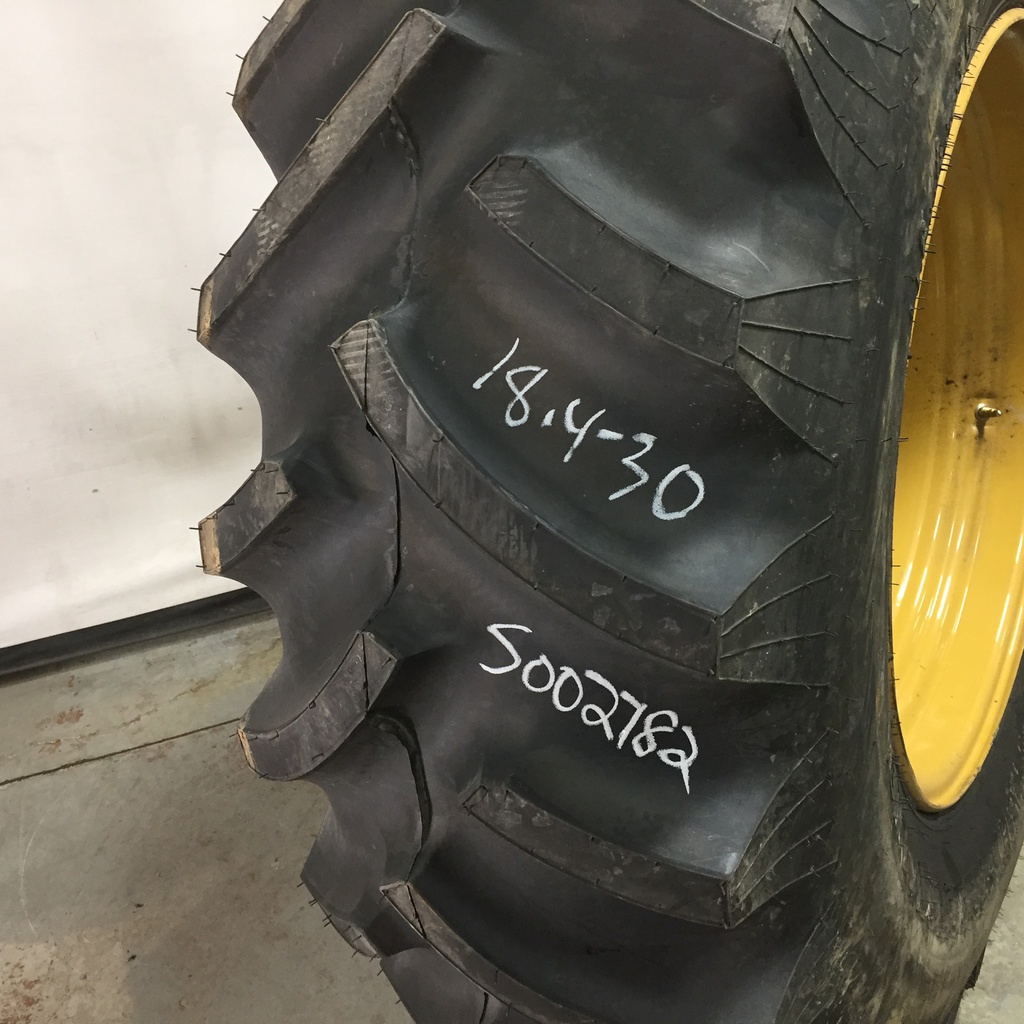 18.4/-30 Titan Farm Hi Traction Lug R-1 on Industrial Yellow  10-Hole Formed Plate 99%