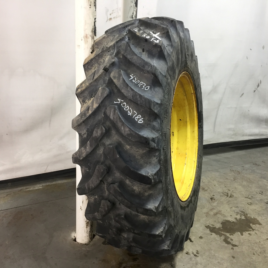 420/90R30 Firestone Radial All Traction FWD R-1 on John Deere Yellow 8-Hole Rim with Clamp/U-Clamp (groups of 2 bolts) 75%