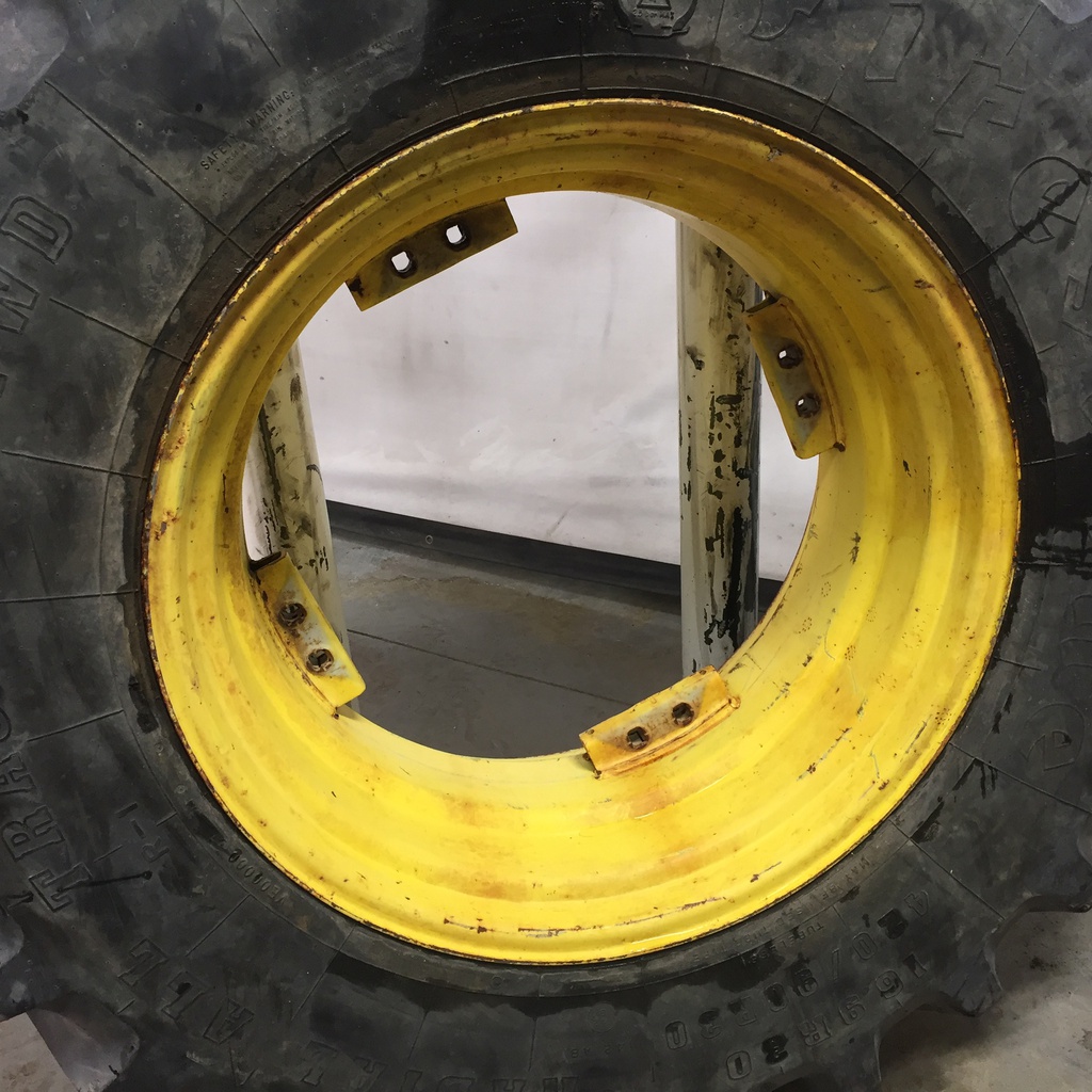 420/90R30 Firestone Radial All Traction FWD R-1 on John Deere Yellow 8-Hole Rim with Clamp/U-Clamp (groups of 2 bolts) 75%