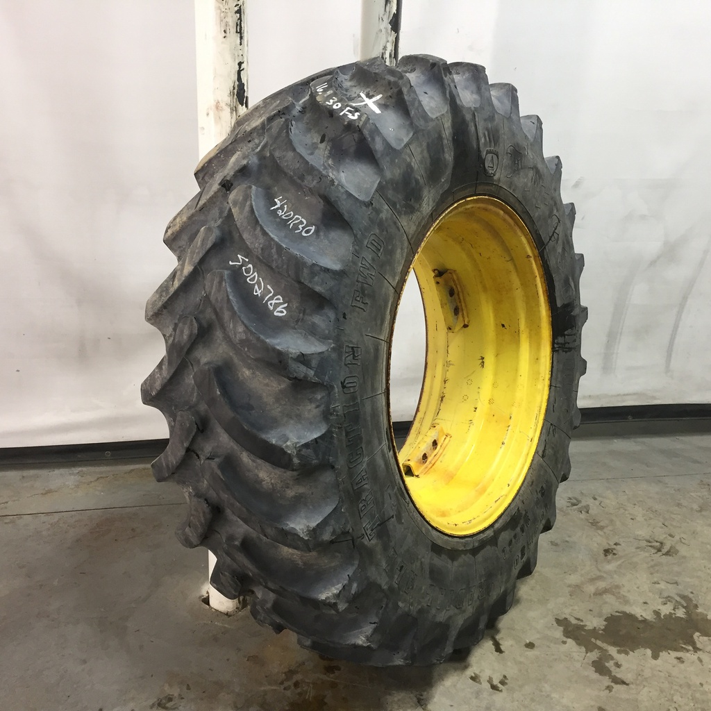 420/90R30 Firestone Radial All Traction FWD R-1 on John Deere Yellow 8-Hole Rim with Clamp/U-Clamp (groups of 2 bolts) 75%