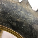 18.4/-38 Firestone Super All Traction II 23 R-1 on John Deere Yellow 8-Hole Rim with Clamp/Loop Style (groups of 2 bolts) 75%