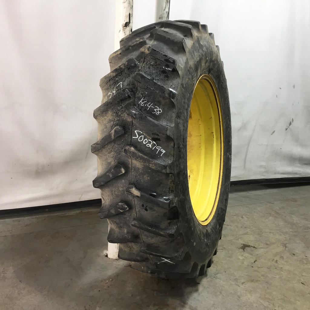 18.4/-38 Firestone Super All Traction II 23 R-1 on John Deere Yellow 8-Hole Rim with Clamp/Loop Style (groups of 2 bolts) 75%