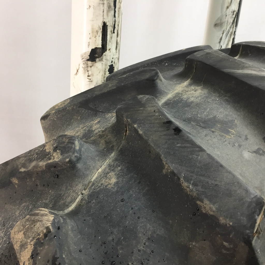 18.4/-38 Firestone Super All Traction II 23 R-1 on John Deere Yellow 8-Hole Rim with Clamp/Loop Style (groups of 2 bolts) 75%