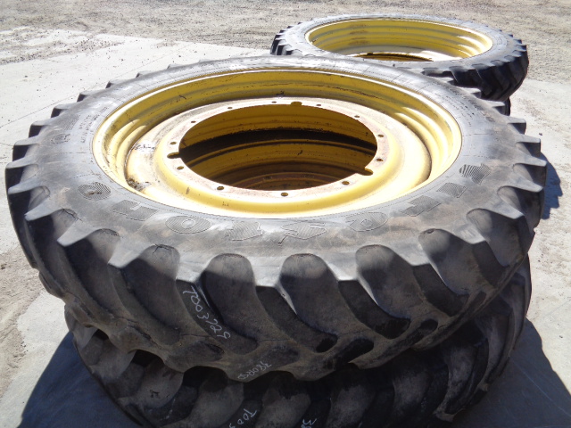 380/90R50 Firestone Radial 9000 R-1W on John Deere Yellow 12-Hole Stub Disc 20%