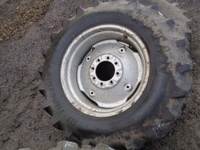 12.4/-24 Titan Farm Hi Traction Lug R-1 on Case IH Silver Mist 8-Hole Formed Plate 55%