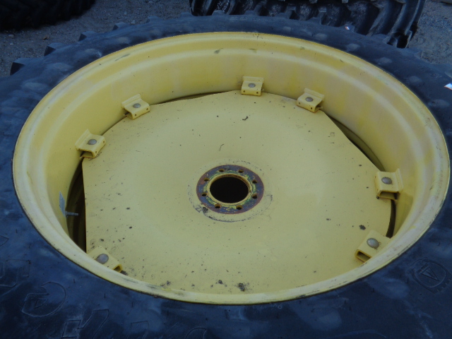 14.9/R46 Firestone Radial All Traction 23 R-1 on John Deere Yellow 8-Hole Rim with Clamp/U-Clamp (groups of 2 bolts) 50%