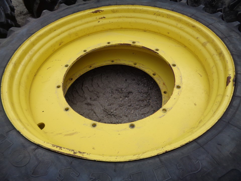 320/90R50 Firestone Radial 9000 R-1W on John Deere Yellow 12-Hole Stub Disc 75%