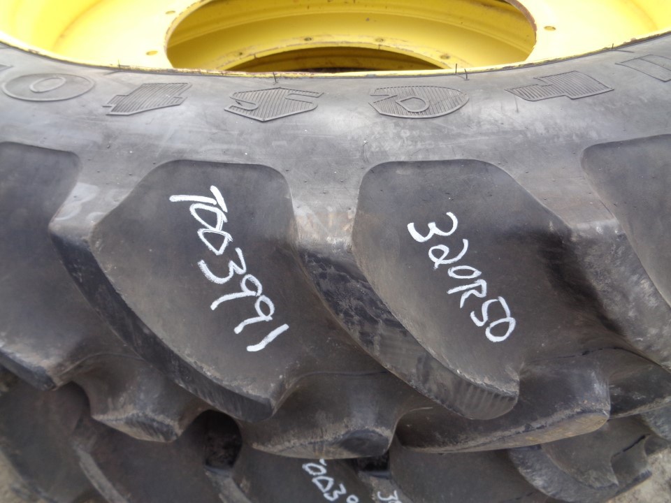 320/90R50 Firestone Radial 9000 R-1W on John Deere Yellow 12-Hole Stub Disc 75%