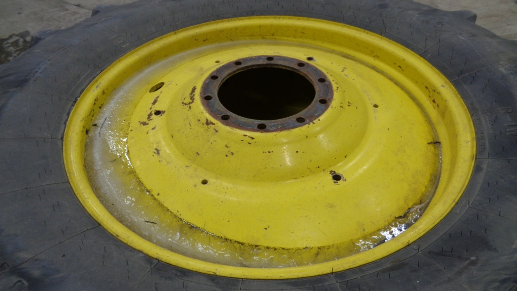 710/70R42 Firestone Radial All Traction DT R-1W on John Deere Yellow 10-Hole Formed Plate W/Weight Holes 45%