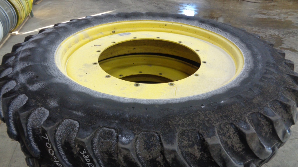 380/105R50 Firestone Radial 9100 R-1 on John Deere Yellow 12-Hole Stub Disc 45%