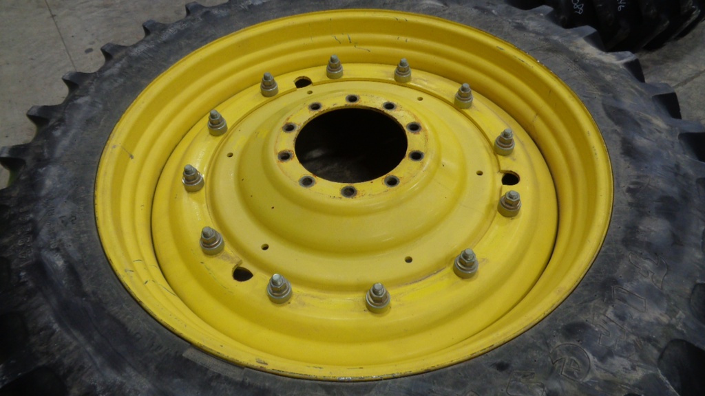 14.9/R46 Firestone Radial All Traction 23 R-1 on John Deere Yellow 10-Hole Stub Disc 75%