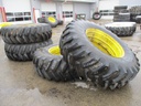 20.8/R34 Firestone Radial All Traction 23 R-1 on John Deere Yellow 0-Hole Double Bevel 34" Cast 80%