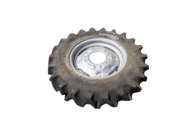 7/-14 Titan Farm Hi Traction Lug R-1 on Case IH Silver Mist 6-Hole Formed Plate 99%