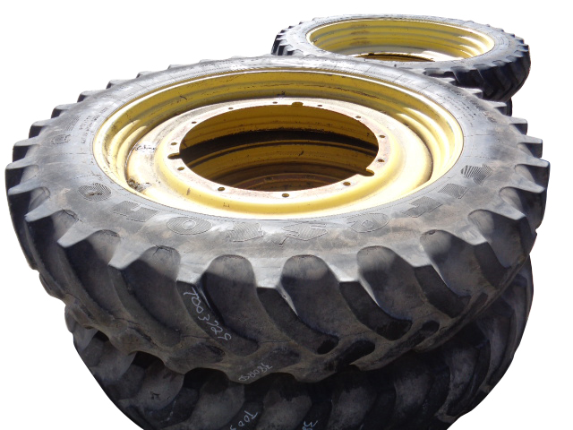 380/90R50 Firestone Radial 9000 R-1W on John Deere Yellow 12-Hole Stub Disc 20%