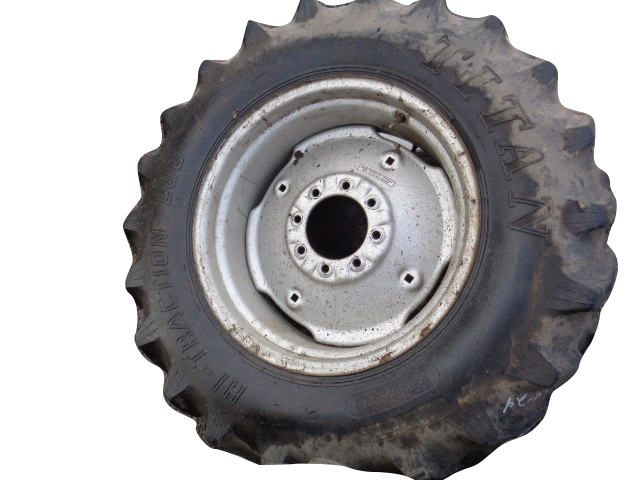 12.4/-24 Titan Farm Hi Traction Lug R-1 on Case IH Silver Mist 8-Hole Formed Plate 55%