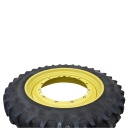 14.9/R46 Firestone Radial All Traction 23 R-1 on John Deere Yellow 12-Hole Stub Disc 60%