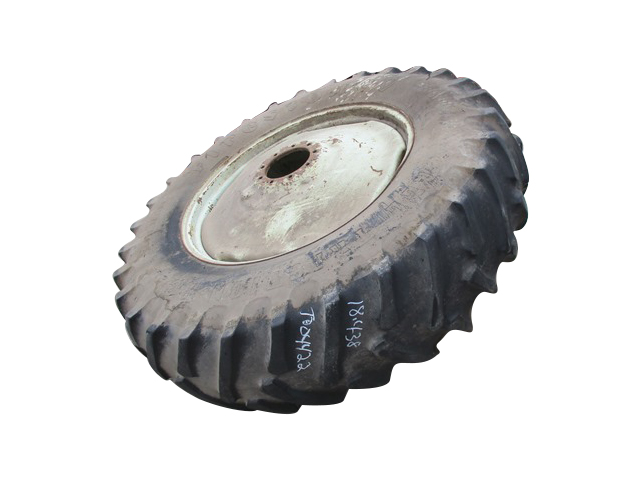 18.4/-38 Firestone All Traction 23 R-1 on John Deere Yellow 9-Hole Stamped Plate 60%