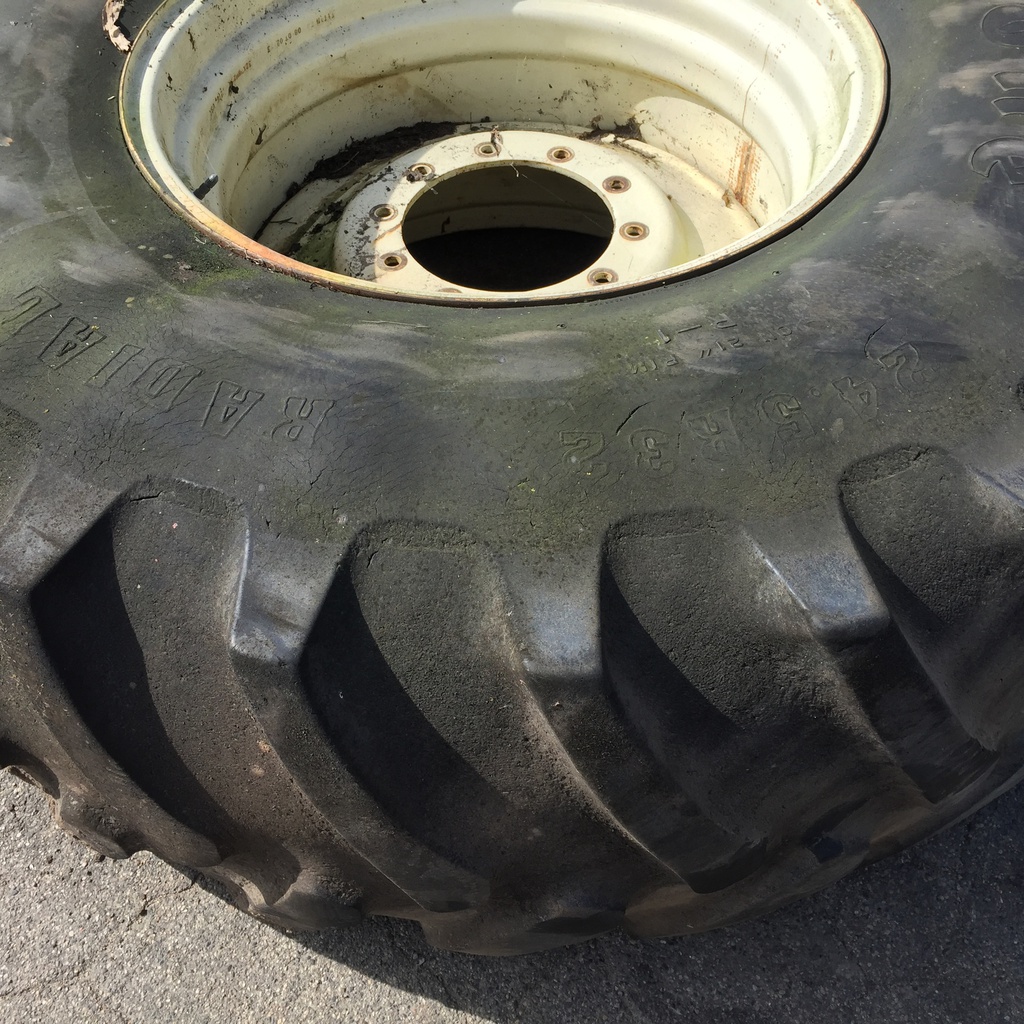 24.5/R32 Firestone Radial All Traction 23 R-1 on Cream 10-Hole Formed Plate 60%